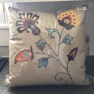 Tan flower bed throw pillows